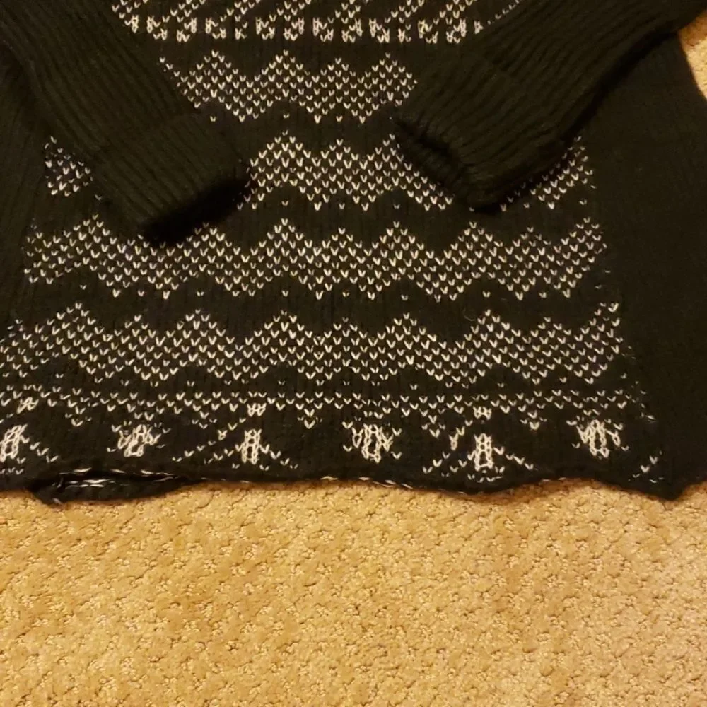 Free people  turtleneck sweater size medium.